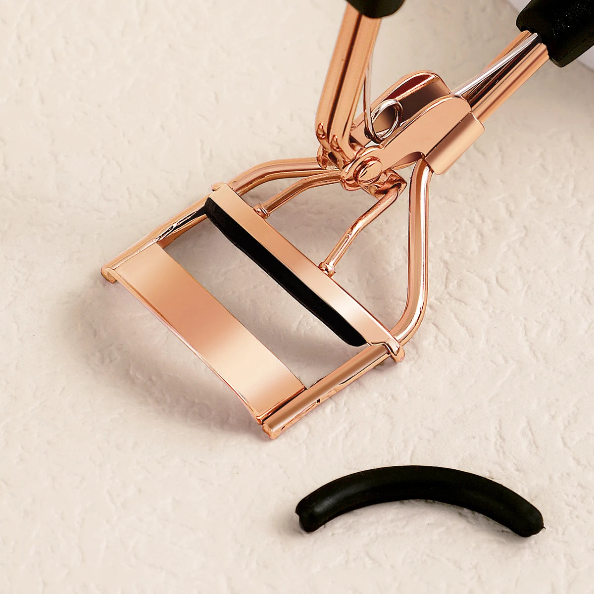 Stainless Steel Eyelash Curler with 15 Silicone Pads, Portable Lash Curling Tool in Seven Color Options for Everyday Makeup and Travel Beauty Kits