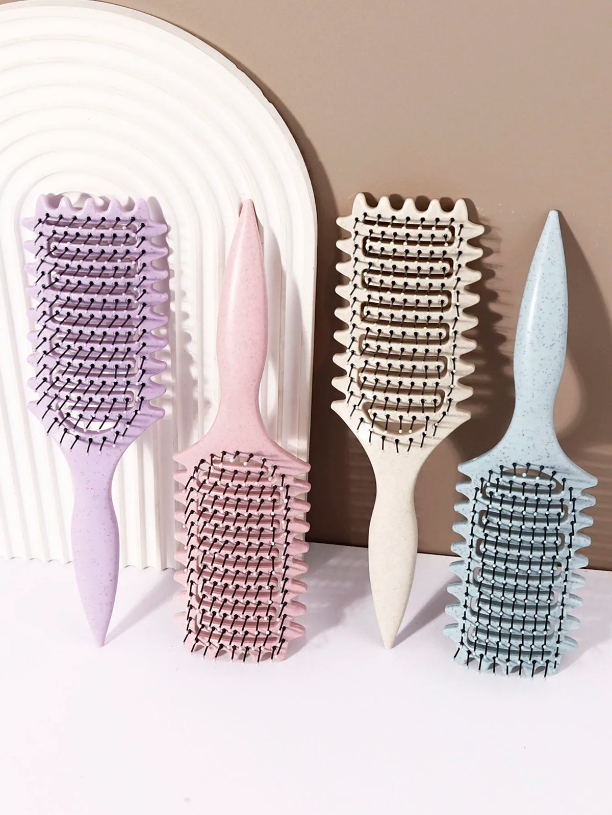 Hollow Hair Styling Brush with Nylon Bristles and ABS Plastic Handle, Four Color Options for Everyday Curl Shaping and Compatible Natural Hair or Wig Grooming