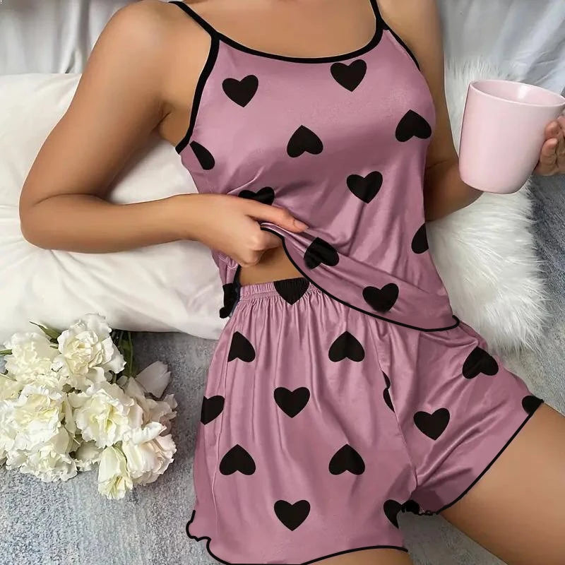 Women's Heart Print Pajama Set with Round Neck Top and Shorts, Polyester Summer Sleepwear for Relaxing at Home in Purple or Blue, Sizes M to XL