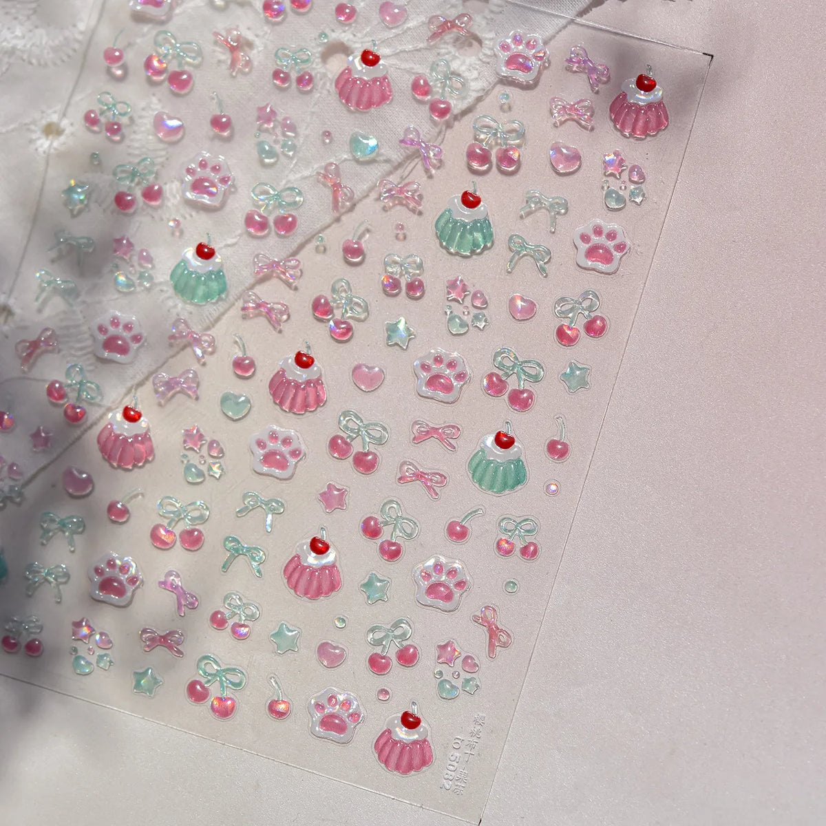 Jelly Nail Art Stickers with Cat Claw, Cherry and Bow Themes, Shiny 5D Self-Adhesive Nail Decals in TO5082 or TO5083 Styles for DIY Manicures