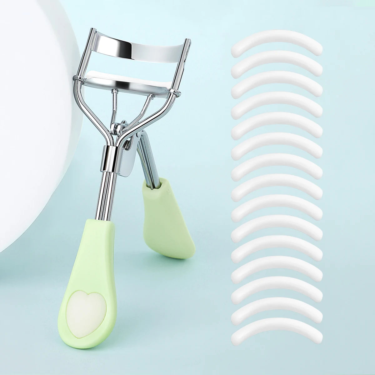 Stainless Steel Eyelash Curler with 15 Silicone Pads, Portable Lash Curling Tool in Seven Color Options for Everyday Makeup and Travel Beauty Kits