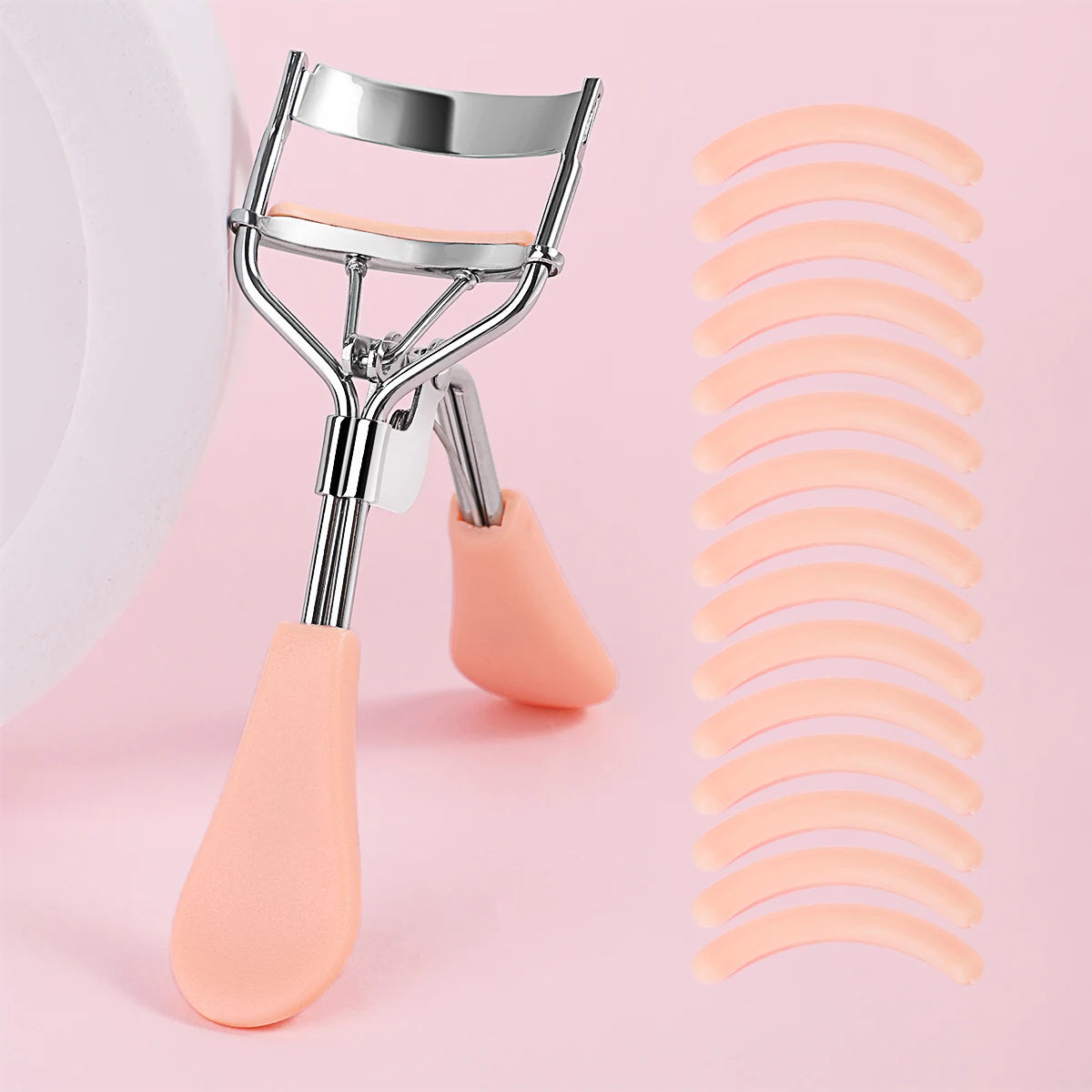 Stainless Steel Eyelash Curler with 15 Silicone Pads, Portable Lash Curling Tool in Seven Color Options for Everyday Makeup and Travel Beauty Kits