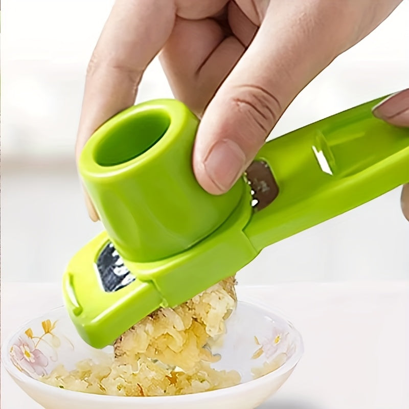 Mini Garlic Grinder in Green Plastic, Single Manual Garlic Mashing Tool with Compact Design for Home Kitchens, Picnic Meal Prep and Barbecue Marinades