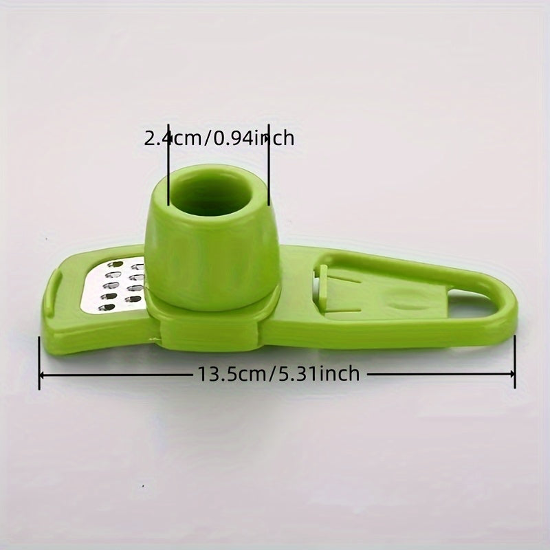 Mini Garlic Grinder in Green Plastic, Single Manual Garlic Mashing Tool with Compact Design for Home Kitchens, Picnic Meal Prep and Barbecue Marinades