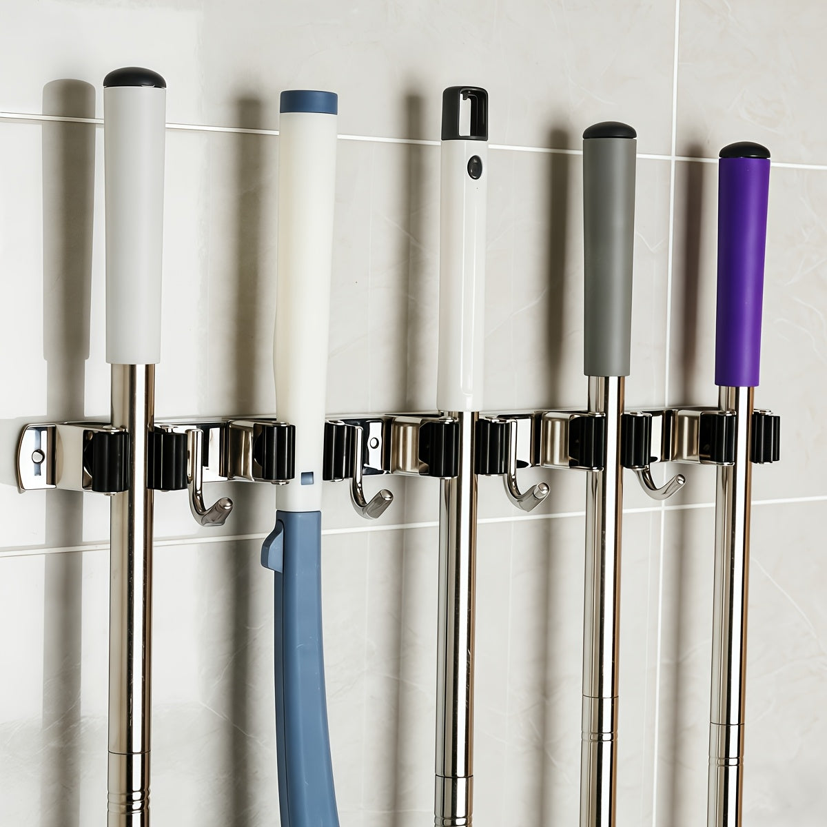 Stainless Steel Mop and Broom Holder with Self-Adhesive Wall-Mount Design, Three-Rack Two-Hook or Five-Rack Four-Hook Styles in One or Two Pack Options for Utility Storage