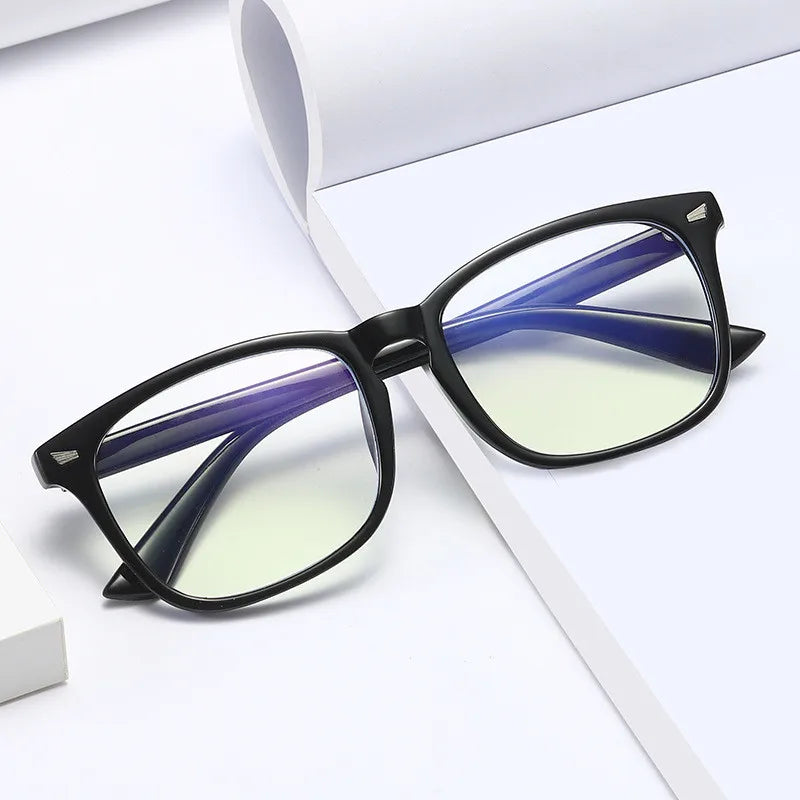 Square Frame Computer Glasses for Women and Men with Transparent or Black Frame Options and Listed Blue Light Filter Reference for Everyday Desk Outfits