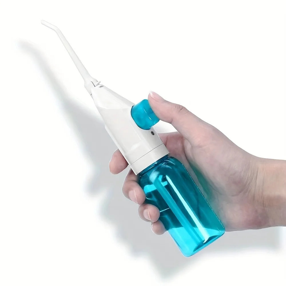 Manual Oral Irrigator with Portable Plastic Design, Hand-Operated Water Flosser in Black, Blue or Pink for Everyday Home and Travel Oral Care Routines