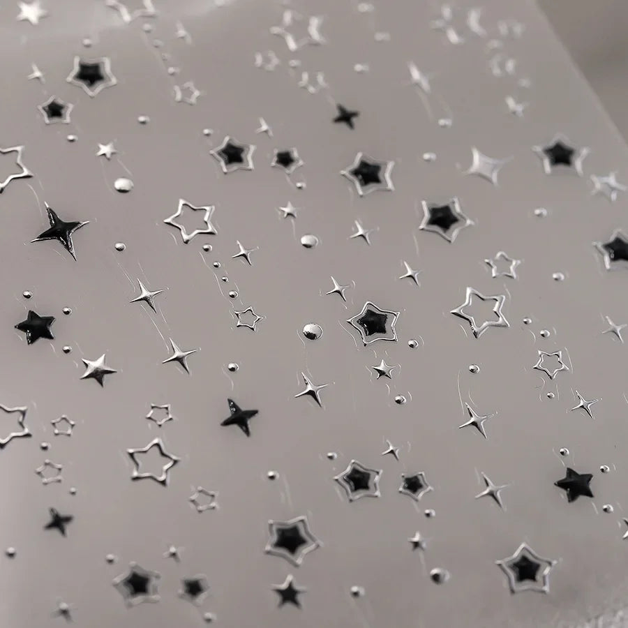Star Nail Stickers with Five-Pointed Motifs, Black and Silver Color References and Hollow-Out Gilding-Style Details for Creative DIY Manicure Decoration