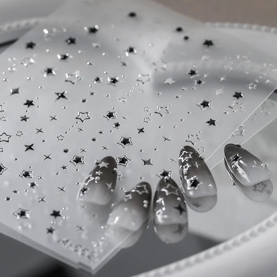 Star Nail Stickers with Five-Pointed Motifs, Black and Silver Color References and Hollow-Out Gilding-Style Details for Creative DIY Manicure Decoration