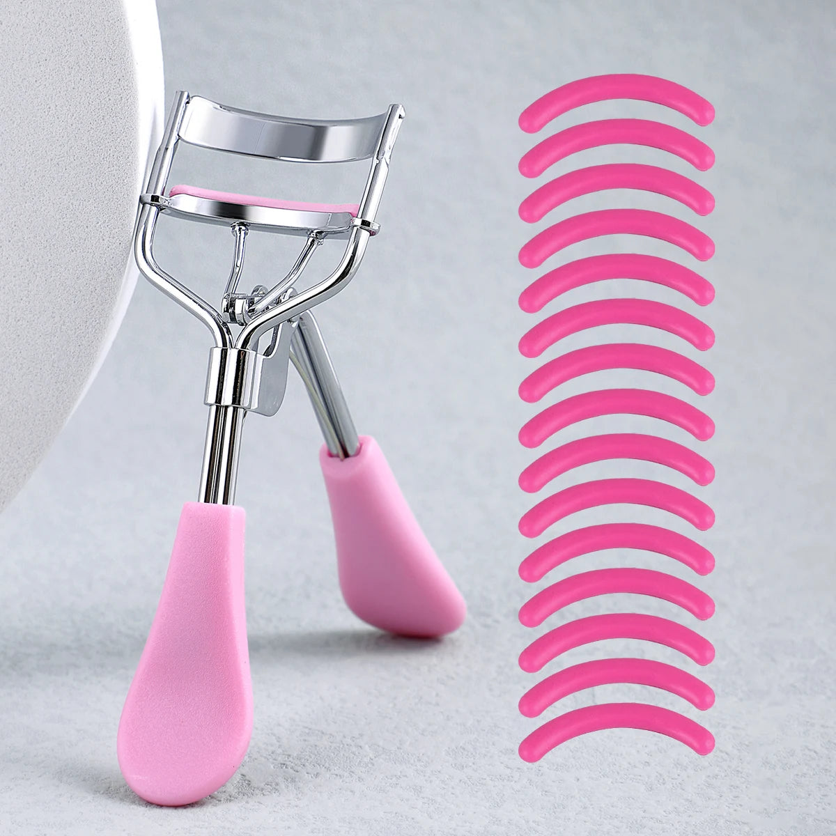Stainless Steel Eyelash Curler with 15 Silicone Pads, Portable Lash Curling Tool in Seven Color Options for Everyday Makeup and Travel Beauty Kits