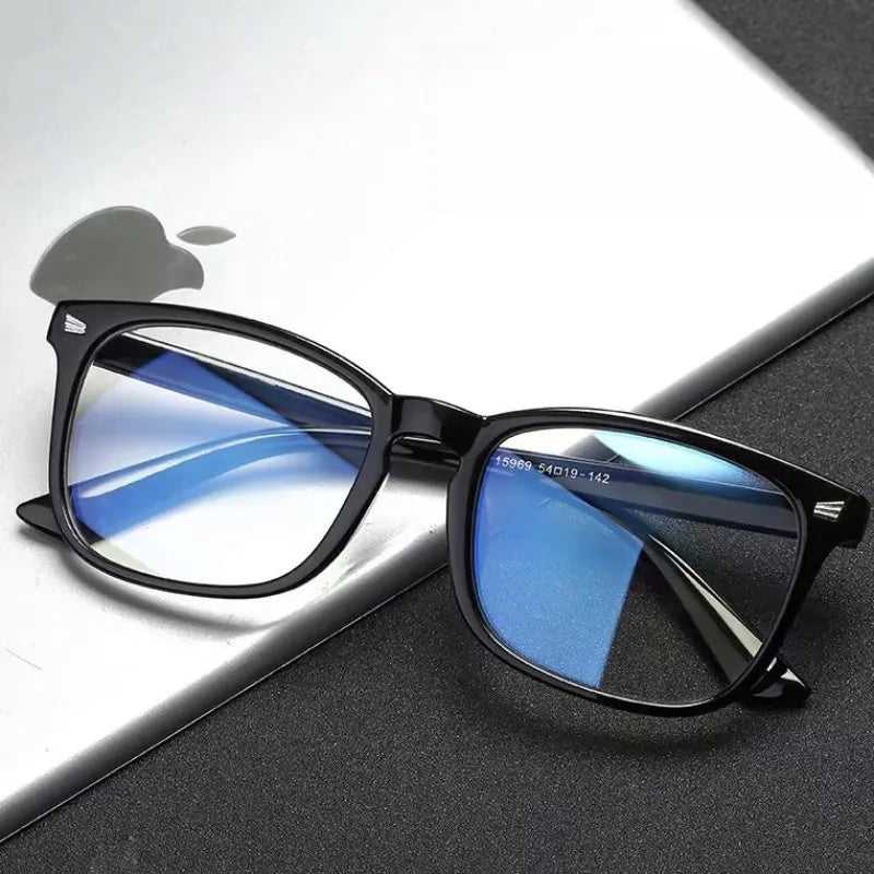 Square Frame Computer Glasses for Women and Men with Transparent or Black Frame Options and Listed Blue Light Filter Reference for Everyday Desk Outfits