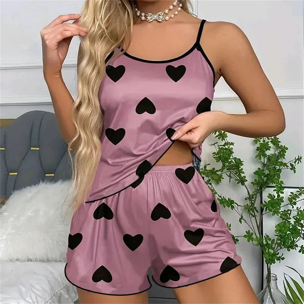 Women's Heart Print Pajama Set with Round Neck Top and Shorts, Polyester Summer Sleepwear for Relaxing at Home in Purple or Blue, Sizes M to XL