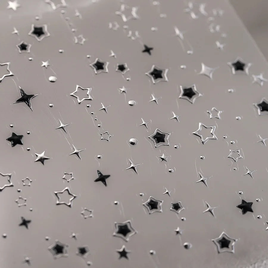 Star Nail Stickers with Five-Pointed Motifs, Black and Silver Color References and Hollow-Out Gilding-Style Details for Creative DIY Manicure Decoration