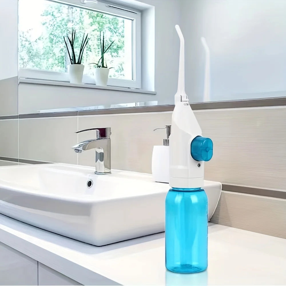 Manual Oral Irrigator with Portable Plastic Design, Hand-Operated Water Flosser in Black, Blue or Pink for Everyday Home and Travel Oral Care Routines