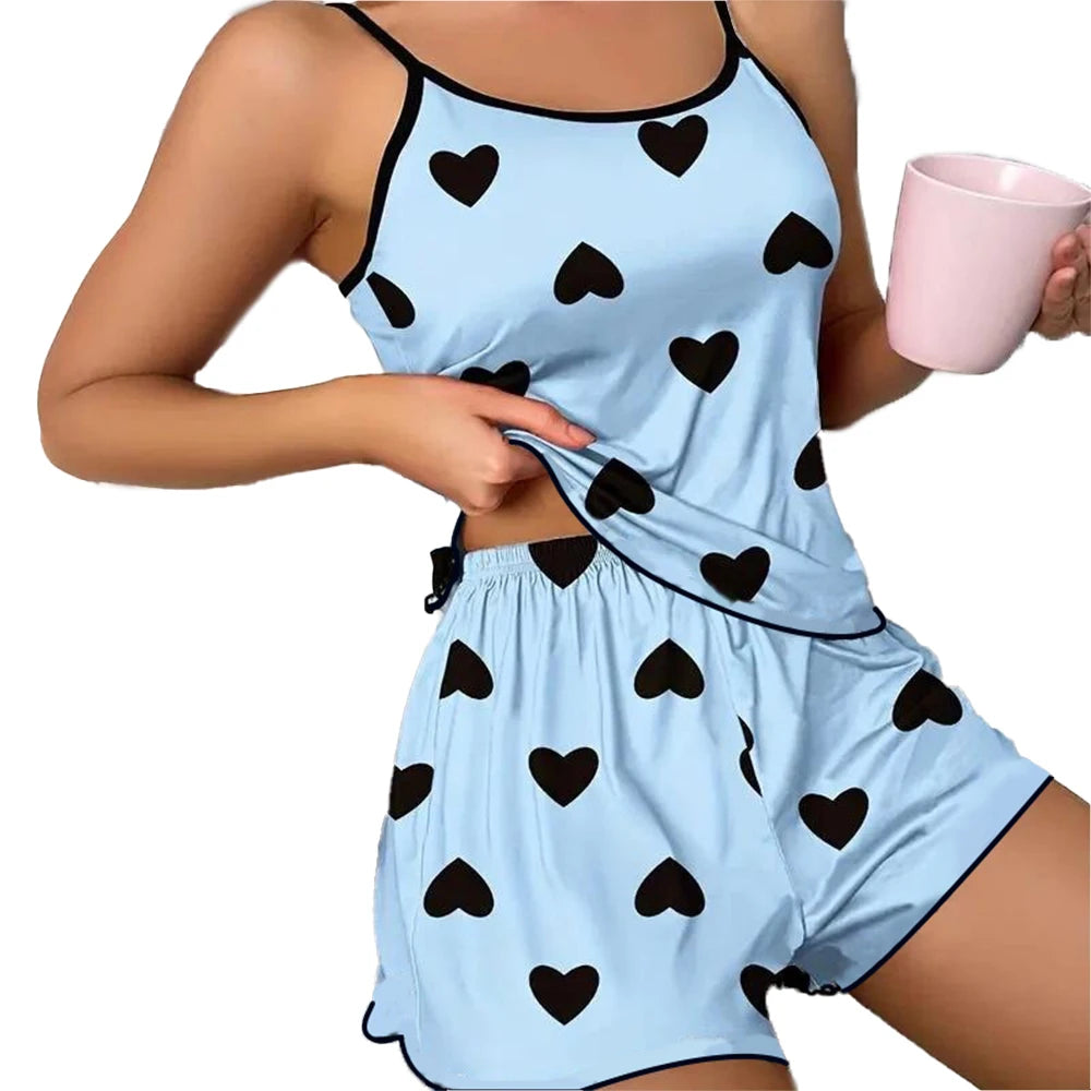 Women's Heart Print Pajama Set with Round Neck Top and Shorts, Polyester Summer Sleepwear for Relaxing at Home in Purple or Blue, Sizes M to XL