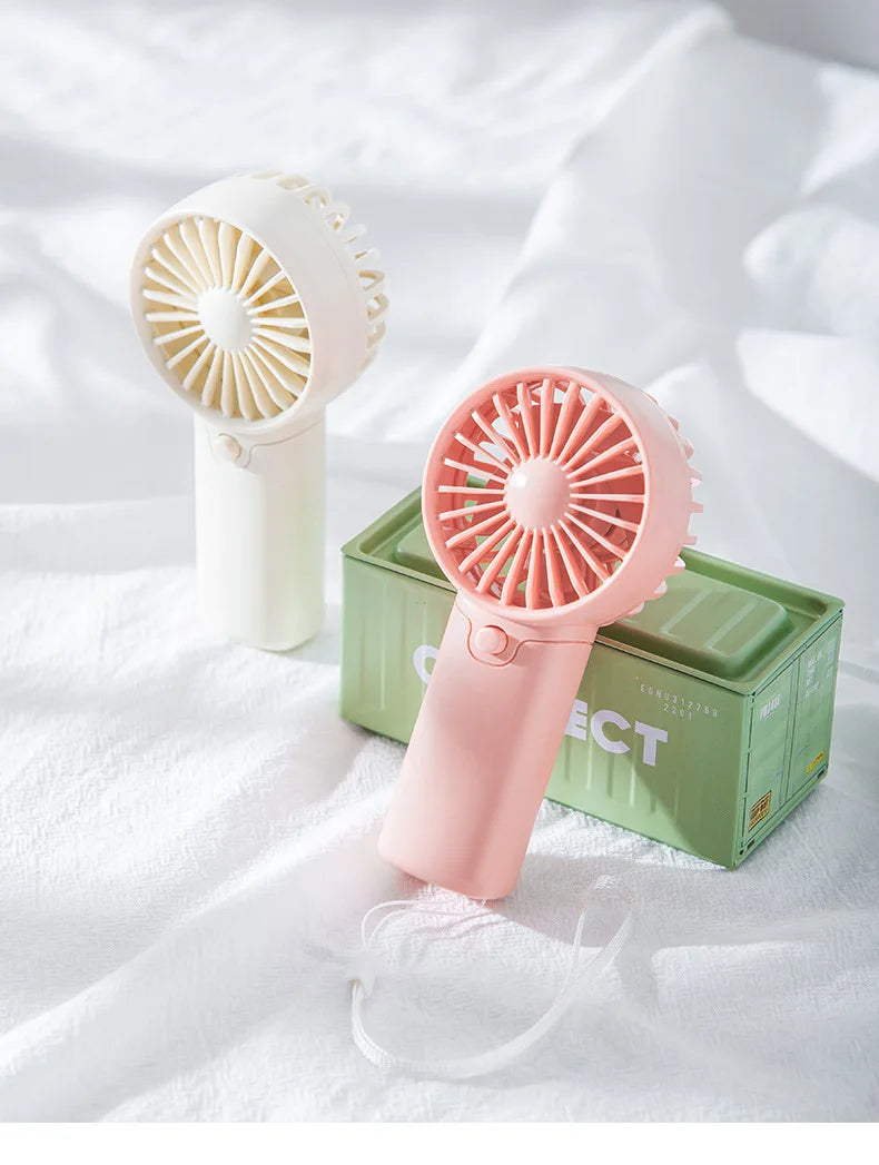 AAA Battery Mini Handheld Fan by MEET SUN, Compact Pocket Personal Fan in White, Pink or Green for Travel and Summer Outings, Batteries Not Included
