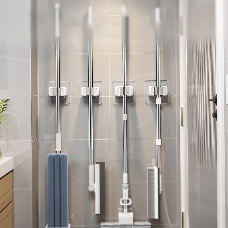 Mop and Broom Holder Clips in White, 4-Piece Self-Adhesive No-Drill Plastic Wall Organizer for Vertical Cleaning Tool Storage in Kitchens and Utility Rooms