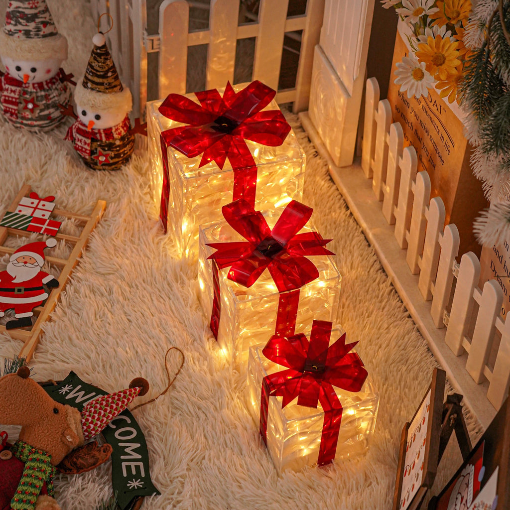 Lighted Christmas Present Boxes, Classic Set of 3 Warm White Decorative Gift Boxes with 60 Listed LEDs, Red Bows, USB or Battery Power and Daily Timer